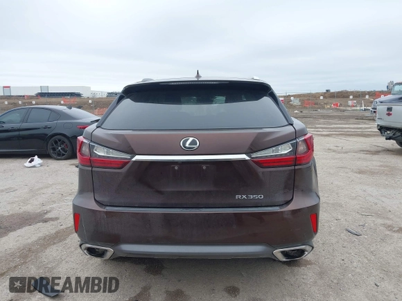 2016 Lexus RX 350 z VIN 2T2ZZMCA5GC029529, wystawiony jako IAAI lot #41953567 z przebiegiem 133 460 mil mil oraz . Historia ofert i sprzedaży dostępna na DreamBid. Obrazek 16.
