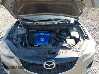 2013 Mazda CX-5 Sport with VIN JM3KE4BE0D0125748, listed as a IAAI auction lot 42143020 with 158,580 mi miles. Bid and sale history available at carsss.com. Image 10.