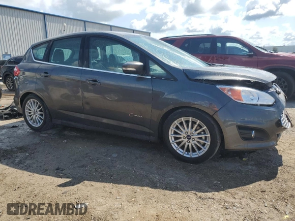 2016 Ford C-Max Energi SEL with VIN 1FADP5CU0GL101658, listed as a Copart auction lot 68214393 with 66,390 mi miles. Bid and sale history available at carsss.com. Image 4.