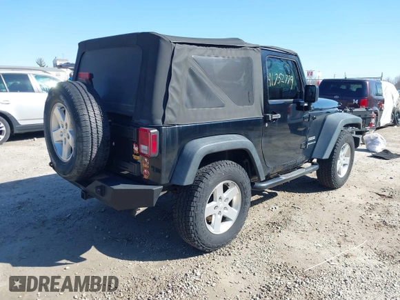 2014 Jeep Wrangler Sport with VIN 1C4AJWAGXEL319749, listed as a IAAI auction lot 41752779 with 140,045 mi miles and . Bid and sale history available at DreamBid. Image 4.
