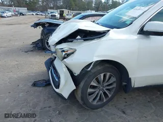 2016 Acura MDX w/Tech with VIN 5FRYD3H4XGB015163, listed as a IAAI auction lot 41635045 with 189,000 mi miles. Bid and sale history available at carsss.com. Image 17.