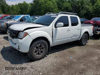 2015 Nissan Frontier Pro-4X with VIN 1N6AD0EV5FN715233, listed as a Copart auction lot 62808565 with 107,548 mi miles and Salvage title. Bid and sale history available at DreamBid. Image 1.