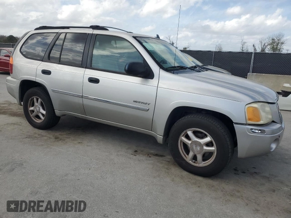 2006 GMC Envoy SLT with VIN 1GKDS13S662139632, listed as a Copart auction lot 47387245 with 246,803 mi miles and Salvage Title. Bid and sale history available at carsss.com. Image 4.