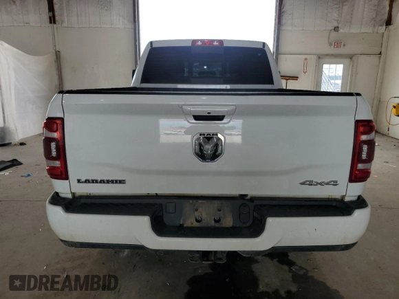 2023 Ram 2500 Laramie with VIN 3C6UR5FL2PG632162, listed as a Copart auction lot 56220575 with 59,902 mi miles and Salvage title. Bid and sale history available at DreamBid. Image 6.