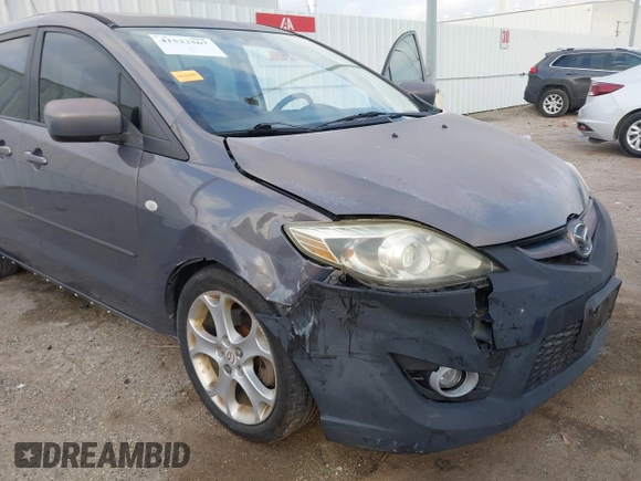 2009 Mazda 5 Sport with VIN JM1CR29L990341261, listed as a IAAI auction lot 41522567 with 123,465 mi miles and . Bid and sale history available at DreamBid. Image 6.