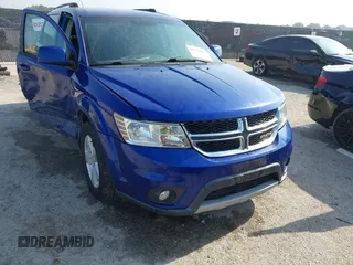 2012 Dodge Journey SXT z VIN 3C4PDCBG7CT361666, wystawiony jako IAAI lot #42334521 z przebiegiem 107 513 mil mil oraz . Historia ofert i sprzedaży dostępna na DreamBid. Obrazek 1.