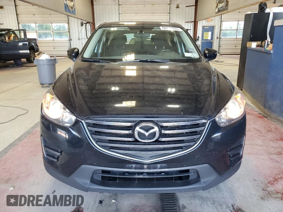 2016 Mazda CX-5 Sport with VIN JM3KE4BY1G0870166, listed as a Copart auction lot 60433035 with 93,433 mi miles and Salvage title. Bid and sale history available at DreamBid. Image 5.