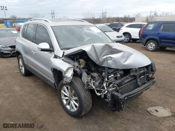2017 Volkswagen Tiguan Wolfsburg Edition with VIN WVGSV7AX8HK031345, listed as a IAAI auction lot 41348567 with 130,313 mi miles. Bid and sale history available at carsss.com. Image 1.