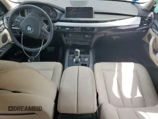 2014 BMW X5 xDrive35i z VIN 5UXKR0C54E0K46819, wystawiony jako Copart lot #54607325 z przebiegiem 135 489 mil mil oraz Szkody całkowita. Historia ofert i sprzedaży dostępna na DreamBid. Obrazek 8.
