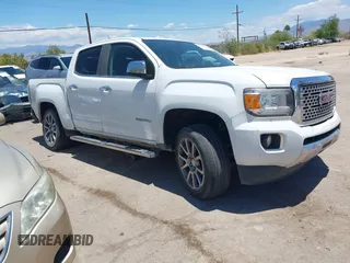2017 GMC Canyon 4WD Denali z VIN 1GTG6EEN0H1194100, wystawiony jako IAAI lot #42360169 z przebiegiem 152 823 mil mil oraz . Historia ofert i sprzedaży dostępna na DreamBid. Obrazek 1.