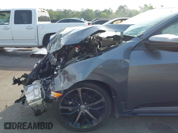 2021 Honda Civic Sport with VIN SHHFK7H44MU217741, listed as a IAAI auction lot 42029373 with 68,572 mi miles and . Bid and sale history available at DreamBid. Image 20.