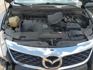 2012 Mazda CX-9 Grand Touring z VIN JM3TB2DAXC0358272, wystawiony jako Copart lot #60703665 z przebiegiem 278 558 mil mil oraz Szkoda całkowita • Salvage title. Historia ofert i sprzedaży dostępna na DreamBid. Obrazek 12.