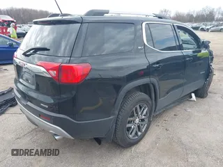 2017 GMC Acadia SLT with VIN 1GKKNULS5HZ324071, listed as a IAAI auction lot 42114675 with 87,298 mi miles and . Bid and sale history available at DreamBid. Image 4.