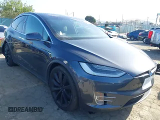 2018 Tesla Model X 75D with VIN 5YJXCBE22JF124270, listed as a IAAI auction lot 41909734 with 92,553 mi miles. Bid and sale history available at carsss.com. Image 1.