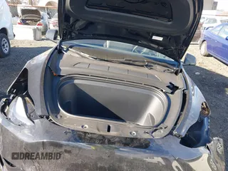 2025 Tesla Model Y Long Range with VIN 7SAYGDED7SF229722, listed as a IAAI auction lot 41330526 with 2,901 mi miles and . Bid and sale history available at DreamBid. Image 10.