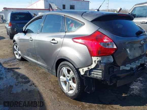 2013 Ford Focus SE with VIN 1FADP3K28DL323879, listed as a IAAI auction lot 41449022 with 133,735 mi miles. Bid and sale history available at carsss.com. Image 3.