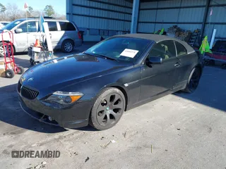 2007 BMW 6 Series 650i with VIN WBAEK13507CN84354, listed as a IAAI auction lot 41604376 with 97,956 mi miles. Bid and sale history available at carsss.com. Image 2.