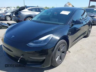 2021 Tesla Model 3 Long Range with VIN 5YJ3E1EB2MF065583, listed as a IAAI auction lot 42067399 with 52,333 mi miles. Bid and sale history available at carsss.com. Image 20.