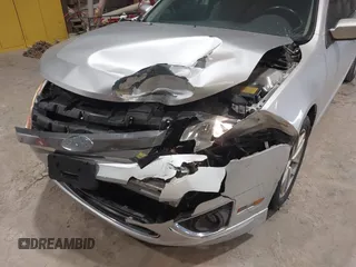 2012 Ford Fusion SEL z VIN 3FAHP0JA4CR218166, wystawiony jako IAAI lot #41744314 z przebiegiem Nie podano mil oraz . Historia ofert i sprzedaży dostępna na DreamBid. Obrazek 6.