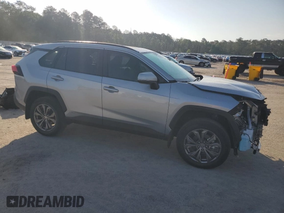 2024 Toyota RAV4 Hybrid XLE Premium z VIN 2T3B6RFV0RW074218, wystawiony jako Copart lot #56917295 z przebiegiem 14 969 mil mil oraz Szkoda całkowita • Salvage title. Historia ofert i sprzedaży dostępna na DreamBid. Obrazek 4.