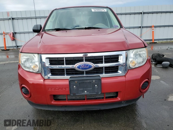 2011 Ford Escape XLS with VIN 1FMCU9C75BKC31381, listed as a Copart auction lot 52886575 with 128,640 mi miles and Salvage title. Bid and sale history available at DreamBid. Image 5.