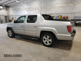 2009 Honda Ridgeline RTL with VIN 5FPYK16569B101779, listed as a Copart auction lot 56175705 with 275,282 mi miles and Clean Title. Bid and sale history available at DreamBid. Image 2.