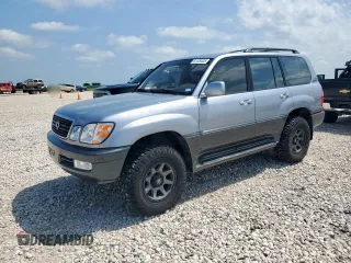 2001 Lexus LX 470 z VIN JTJHT00W313504330, wystawiony jako Copart lot #61126435 z przebiegiem 87 049 mil mil oraz Czysty tytuł • Clean title. Historia ofert i sprzedaży dostępna na DreamBid. Obrazek 1.