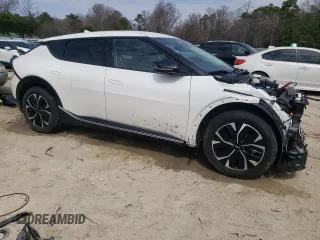 2024 Kia EV6 Wind with VIN KNDC34LA0R5198532, listed as a Copart auction lot 50887565 with 39,490 mi miles and Clean Title. Bid and sale history available at carsss.com. Image 4.