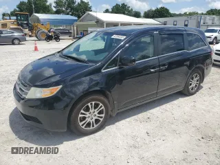 2012 Honda Odyssey EX z VIN 5FNRL5H48CB111405, wystawiony jako Copart lot #62094345 z przebiegiem 159 629 mil mil oraz Czysty tytuł • Clean title. Historia ofert i sprzedaży dostępna na DreamBid. Obrazek 1.