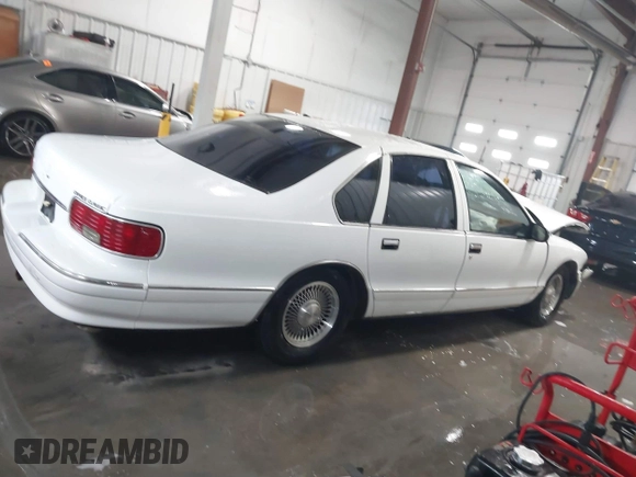1996 Chevrolet Caprice 1SA Special Value z VIN 1G1BL52P3TR165928, wystawiony jako IAAI lot #41271004 z przebiegiem 130 794 mil mil oraz . Historia ofert i sprzedaży dostępna na DreamBid. Obrazek 13.