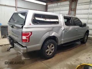 2020 Ford F-150 XL with VIN 1FTEW1E57LKF44499, listed as a Copart auction lot 60336735 with 156,745 mi miles and Salvage title. Bid and sale history available at DreamBid. Image 3.