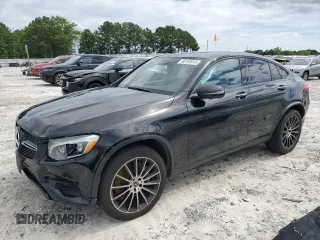 2019 Mercedes-Benz GLC 300 with VIN WDC0J4KB3KF605806, listed as a Copart auction lot 60192015 with 106,576 mi miles and Salvage title. Bid and sale history available at DreamBid. Image 1.