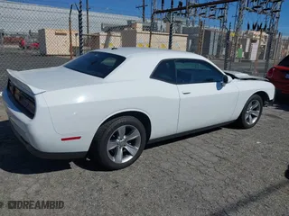 2018 Dodge Challenger SXT with VIN 2C3CDZAG4JH317735, listed as a IAAI auction lot 41642772 with 100,843 mi miles. Bid and sale history available at carsss.com. Image 4.
