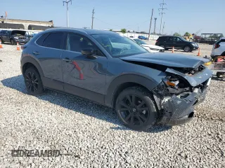 2023 Mazda CX-30 S Preferred with VIN 3MVDMBCMXPM561795, listed as a Copart auction lot 60297525 with 42,212 mi miles and Salvage title. Bid and sale history available at DreamBid. Image 4.