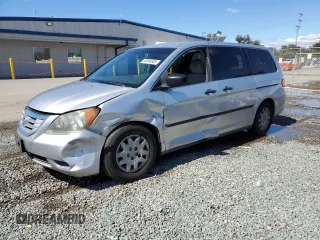 2010 Honda Odyssey LX with VIN 5FNRL3H26AB027406, listed as a Copart auction lot 46946685 with 148,082 mi miles and Salvage Title. Bid and sale history available at carsss.com. Image 1.