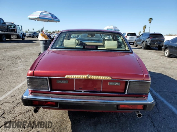 1994 Jaguar XJ with VIN SAJKX1747RC690894, listed as a Copart auction lot 88499345 with 24,006 mi miles and Clean Title. Bid and sale history available at DreamBid. Image 6.