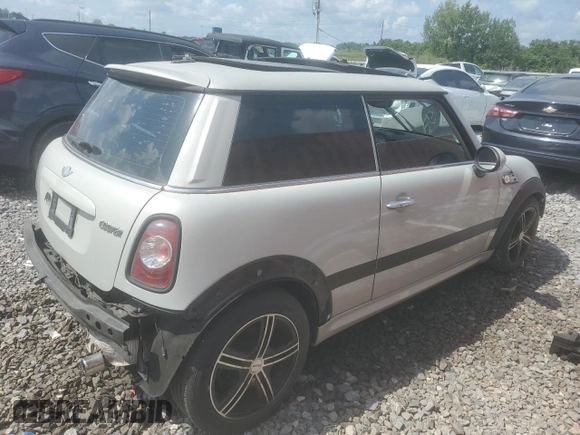 2011 MINI Hardtop z VIN WMWSU3C55BT095286, wystawiony jako Copart lot #62580075 z przebiegiem 99 253 mil mil oraz Czysty tytuł • Clean title. Historia ofert i sprzedaży dostępna na DreamBid. Obrazek 3.