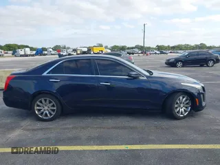 2016 Cadillac CTS RWD with VIN 1G6AP5SX8G0119984, listed as a IAAI auction lot 42098257 with 98,593 mi miles and . Bid and sale history available at DreamBid. Image 13.