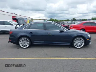 2018 Audi A4 Prestige z VIN WAUFNAF45JA019132, wystawiony jako IAAI lot #42239810 z przebiegiem 63 002 mil mil oraz . Historia ofert i sprzedaży dostępna na DreamBid. Obrazek 13.