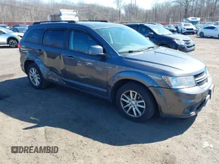 2014 Dodge Journey SXT with VIN 3C4PDCBB2ET156215, listed as a IAAI auction lot 41765840 with 129,737 mi miles. Bid and sale history available at carsss.com. Image 1.