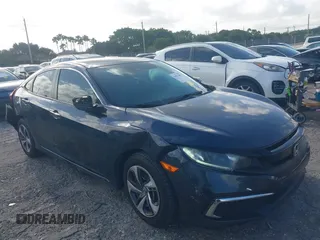 2020 Honda Civic LX z VIN 19XFC2F67LE016023, wystawiony jako IAAI lot #41932891 z przebiegiem 71 224 mil mil oraz . Historia ofert i sprzedaży dostępna na DreamBid. Obrazek 1.