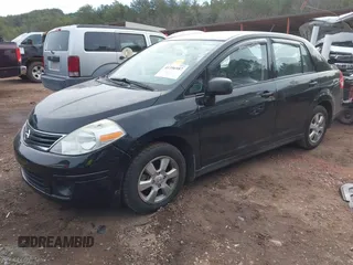 2011 Nissan Versa 1.8 S with VIN 3N1BC1AP5BL444050, listed as a IAAI auction lot 41396987 with 198,463 mi miles. Bid and sale history available at carsss.com. Image 2.