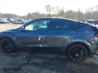 2023 Tesla Model Y Long Range with VIN 7SAYGAEE9PF905943, listed as a IAAI auction lot 41444255 with 11,179 mi miles. Bid and sale history available at carsss.com. Image 13.