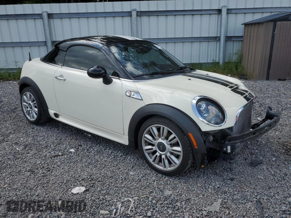 2012 MINI Coupe S z VIN WMWSX3C56CT154872, wystawiony jako Copart lot #68011264 z przebiegiem 91 650 mil mil oraz Szkody całkowita. Historia ofert i sprzedaży dostępna na DreamBid. Obrazek 4.
