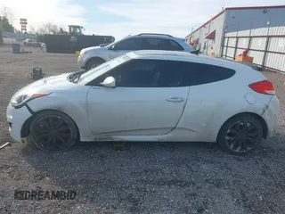 2013 Hyundai Veloster w/Gray Int with VIN KMHTC6AD4DU140121, listed as a IAAI auction lot 41410252 with 202,596 mi miles and . Bid and sale history available at DreamBid. Image 17.
