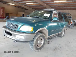 1998 Ford Expedition XLT z VIN 1FMPU18L7WLB31520, wystawiony jako IAAI lot #42240145 z przebiegiem 231 104 mil mil oraz . Historia ofert i sprzedaży dostępna na DreamBid. Obrazek 2.
