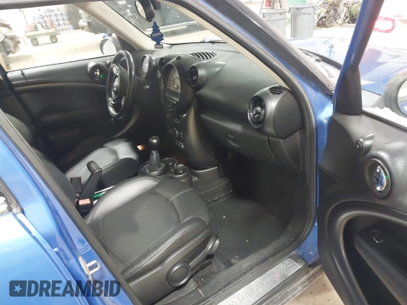 2013 MINI Countryman S ALL4 z VIN WMWZC5C59DWM16261, wystawiony jako IAAI lot #41563270 z przebiegiem 159 516 mil mil oraz . Historia ofert i sprzedaży dostępna na DreamBid. Obrazek 5.