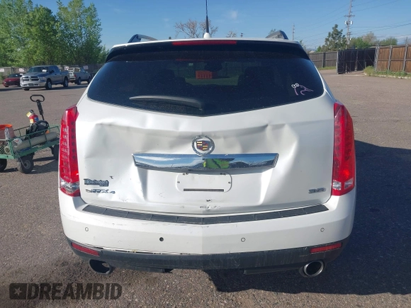 2012 Cadillac SRX Performance Collection z VIN 3GYFNEE30CS652829, wystawiony jako IAAI lot #42156961 z przebiegiem 106 473 mil mil oraz . Historia ofert i sprzedaży dostępna na DreamBid. Obrazek 16.
