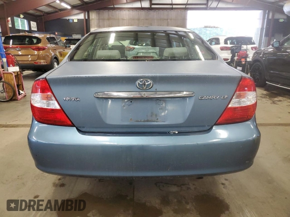 2004 Toyota Camry LE z VIN 4T1BE32K94U820825, wystawiony jako Copart lot #60972565 z przebiegiem 198 899 mil mil oraz Czysty tytuł • Clean title. Historia ofert i sprzedaży dostępna na DreamBid. Obrazek 6.