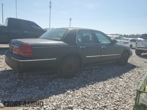 2003 Mercury Grand Marquis GS Convenience with VIN 2MEFM74W03X638534, listed as a Copart auction lot 49371535 with 335,360 mi miles and Salvage Title. Bid and sale history available at DreamBid. Image 3.